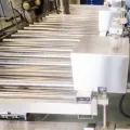 Llenadora automática de tambores (Alineación fotoeléctrica y visión artificial)